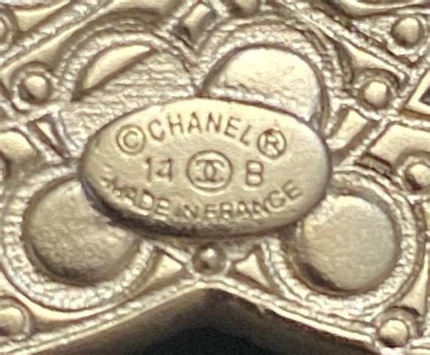 chanel brooch real vs fake|authentic chanel jewelry stamp.